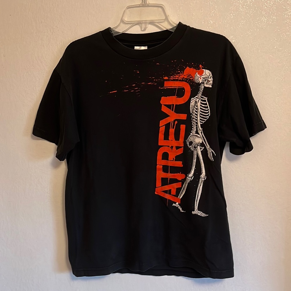 Atreyu band shirt.